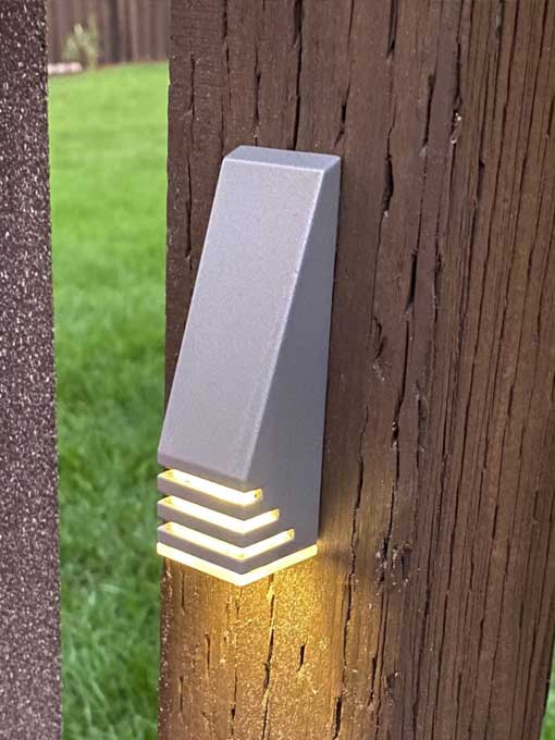 What is the best height to mount the wedge light on a post for optimal coverage?